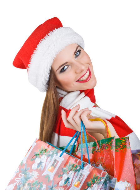 güzel bir kadın Noel kıyafeti ile alışveriş torbaları - Fotoğraf, Görsel