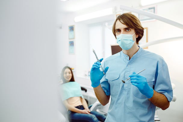 Anestesia dentale su uno sfondo del paziente
 - Foto, immagini