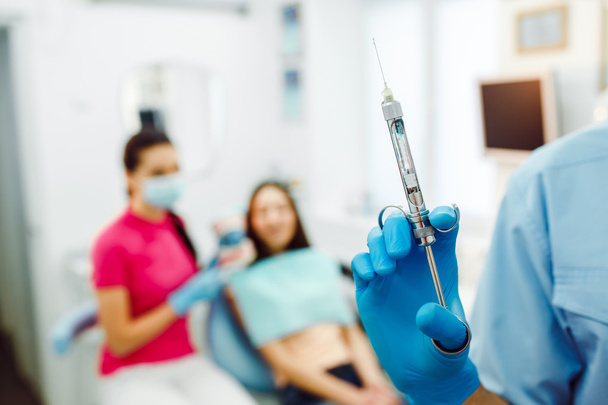 Zahnanästhesie auf dem Hintergrund des Patienten - Foto, Bild