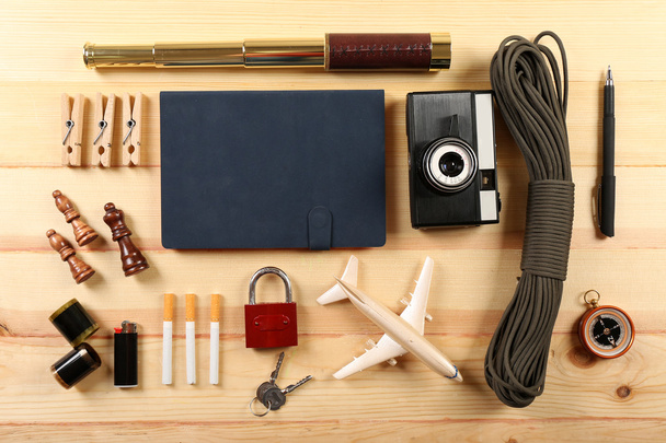 Travel gear on wooden table, top view - Foto, immagini