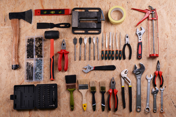 Set of tools on plywood, top view - Valokuva, kuva