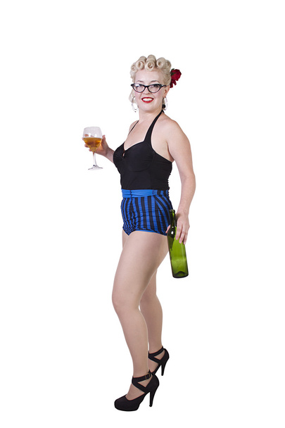 Woman in pin-up dress drinking - Isolated - Фото, изображение