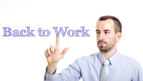 Weer aan het werk - jonge zakenman met blauwe tekst - Foto, afbeelding