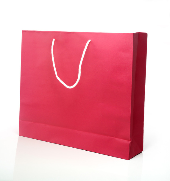 Pink shopping bag isolated on a white background - Photo, Image