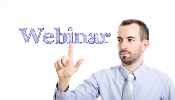 Webinar - Young businessman with blue text - 写真・画像