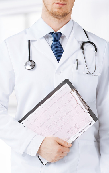 Krankenschwester und Arzt mit Kardiogramm - Foto, Bild