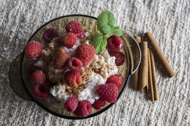 Rice pudding with raspberries - Photo, Image