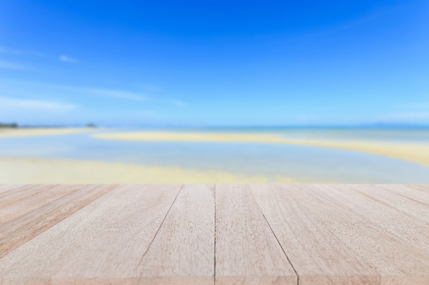 wooden table and tropical beach - Valokuva, kuva