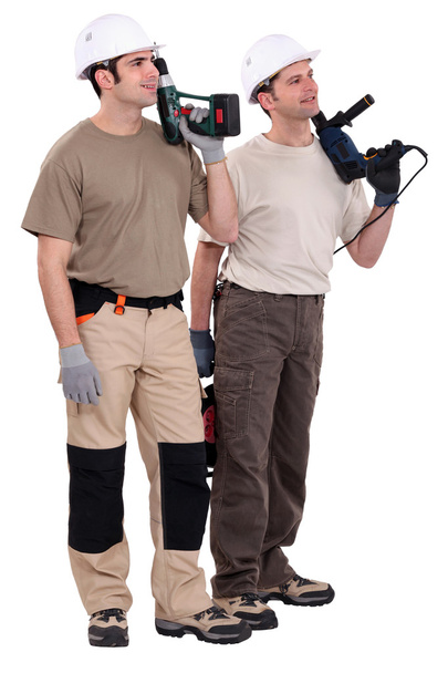 Workmen holding drills - Фото, зображення