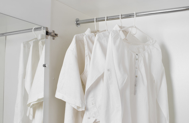 white clean ironed clothes - Fotó, kép