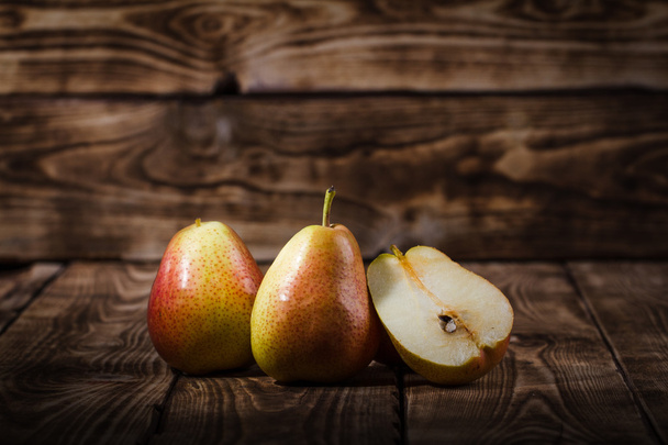 Pears on a wooden background - Zdjęcie, obraz