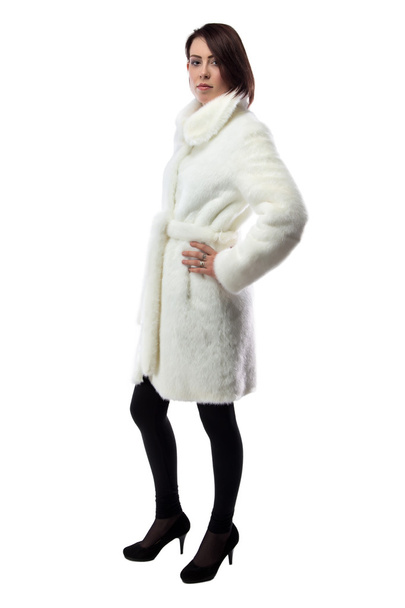 Imagem da mulher de casaco branco, meio virado
 - Foto, Imagem