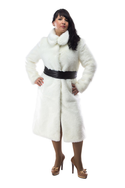 Photo of pudgy brunette in long white coat - Фото, изображение