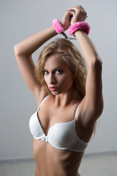 Woman in underwear, bite handcuffs, bdsm, sex toy - Photo, Image