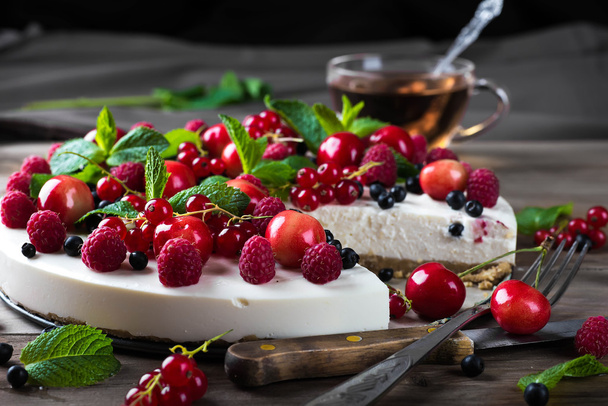 Cheesecake with berries and mint - Photo, image