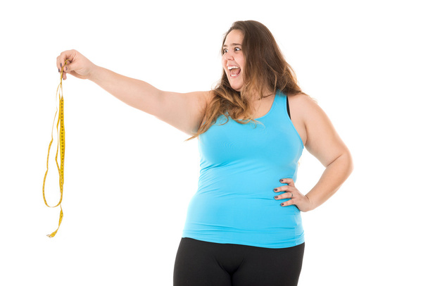 Donna grassa con metro a nastro
 - Foto, immagini