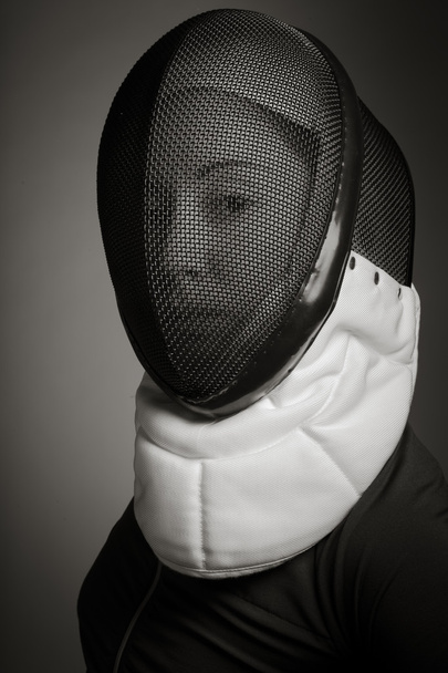 Esgrimista feminina em máscara de esgrima
 - Foto, Imagem