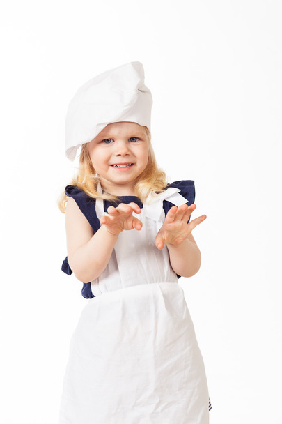 Beautiful blonde hair girl in costume of cook - Фото, изображение