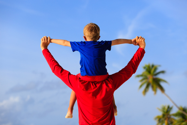 happy father and little son play on sky - Photo, Image