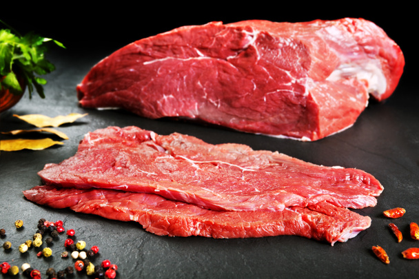 Fresh and raw meat. Still life of steaks ready for cooking, barbecue. - Photo, Image