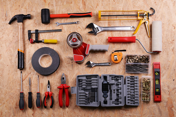 Set of tools on plywood, top view - Fotografie, Obrázek