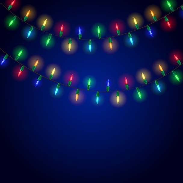 Színes izzó karácsonyi fények a kék háttér - Vektor, kép