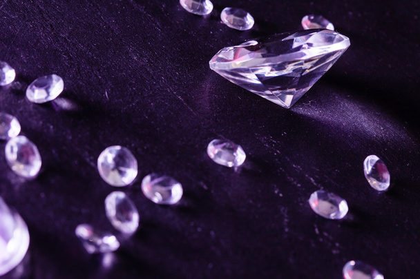 Different diamonds in purple light - Photo, Image