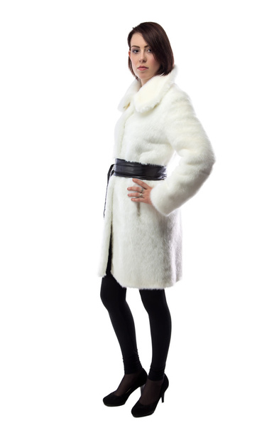 Imagen de una joven con abrigo blanco, medio vuelta
  - Foto, Imagen