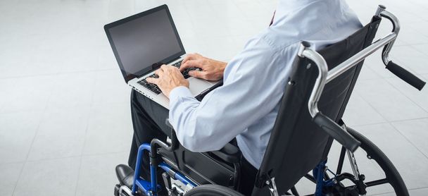Businessman in wheelchair - Fotó, kép