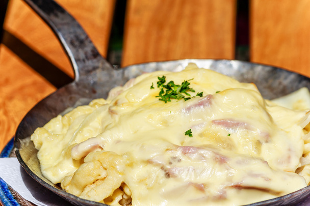 Ham noodles topped with melted cheese - Photo, Image