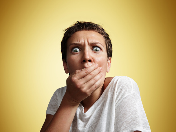 Shocked woman  with hand on mouth - Photo, Image
