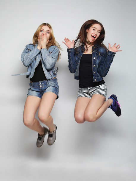  young hipster girls best friends jump  - Photo, image