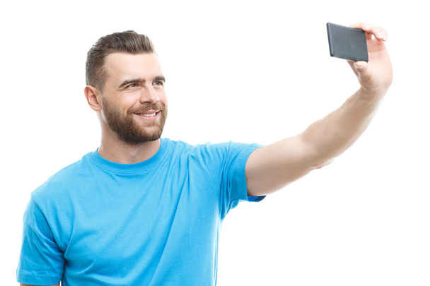 Man with beard doing selfie  - Foto, imagen