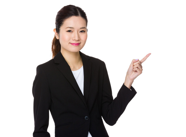 Молодая азиатская бизнесвумен в деловом костюме
 - Фото, изображение