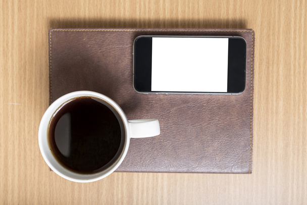Taza de café y smartphone
 - Foto, Imagen