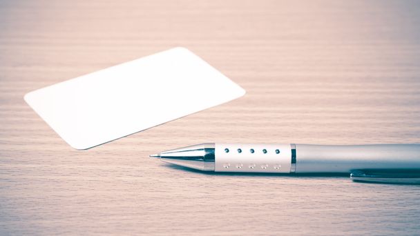 Business card and pen - Foto, afbeelding