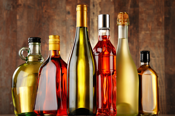 Bottles of assorted alcoholic beverages - Photo, Image