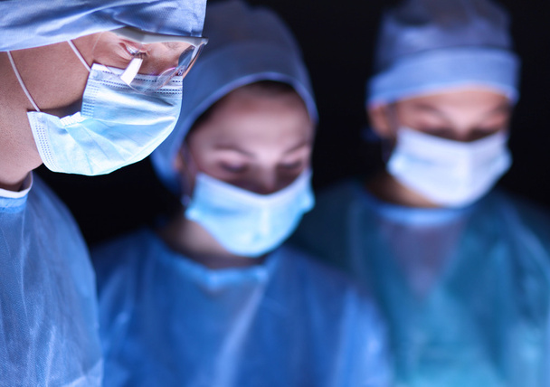 Team surgeon at work in operating room. - Fotoğraf, Görsel