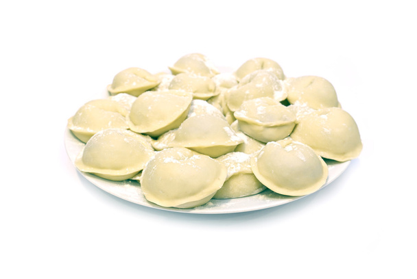 Dumplings sur une plaque isolée
 - Photo, image