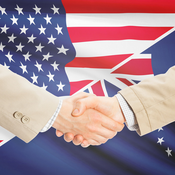 Zakenlieden schudden handen - Verenigde Staten en Cookeilanden - Foto, afbeelding