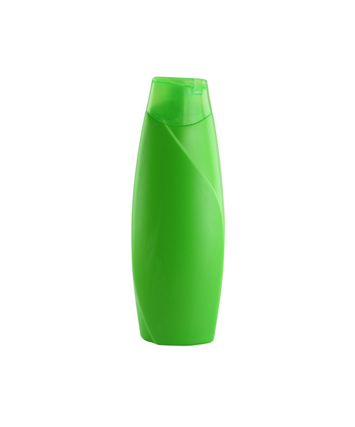 green shampoo bottle isolated on white. - 写真・画像