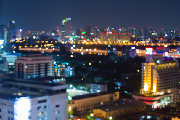 Stadt leuchtet abstrakte kreisförmige Bokeh auf blauem Hintergrund - Foto, Bild