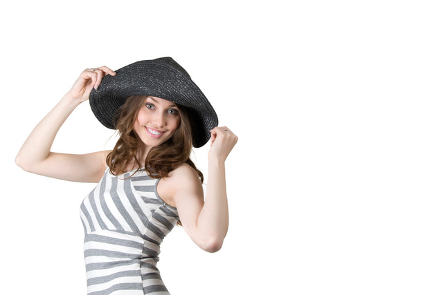 young girl in a black hat looks good - Foto, imagen