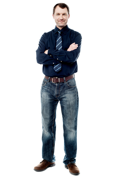 confident business executive with crossed arms - 写真・画像