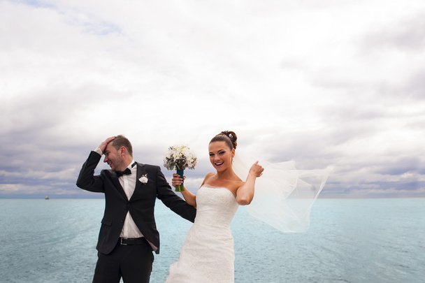 Happy bride on the sea quay. - Photo, Image