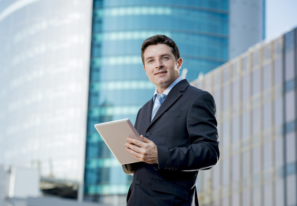corporate portrait businessman with digital tablet outdoors working - Photo, image