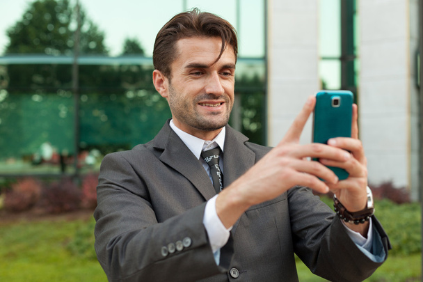 Businessman taking selfie - Fotografie, Obrázek