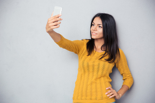 Happy woman making selfie photo - Foto, Bild
