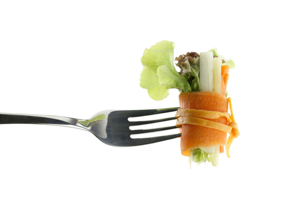 roll salad on fork isolated on white. - Foto, afbeelding