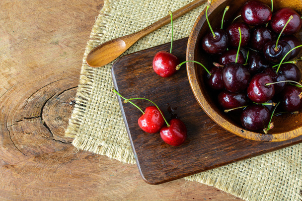 Group of Fresh cherry on wooden table - 写真・画像